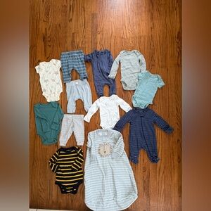 Bundle of newborn baby boy clothes